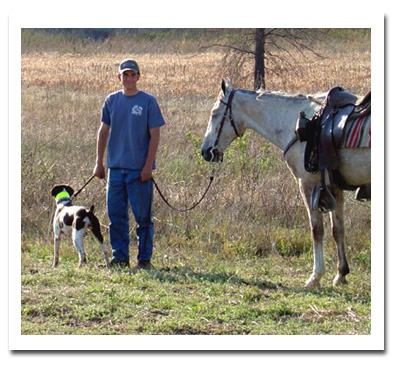 Jimmy standing with Brittany and horse